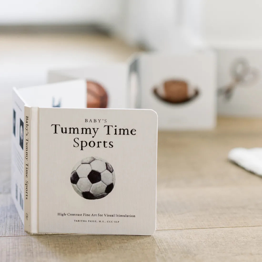 Baby's Tummy Time Sports US - Board book